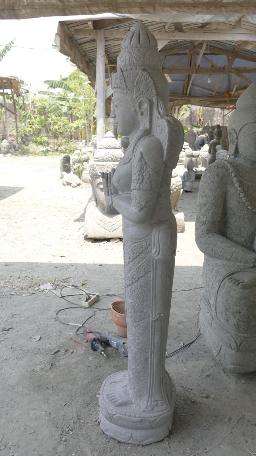  Product image 5 of the product “Standing Sri Dewi. Made from riverstone. Height 180cm ”
